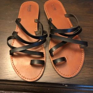 Missing black sandals